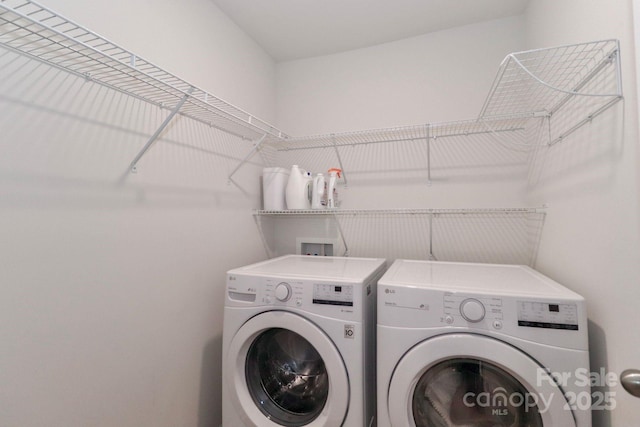 laundry area featuring separate washer and dryer