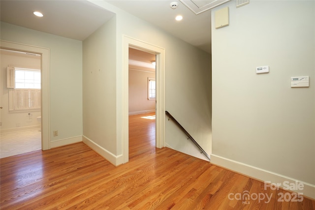 corridor featuring light hardwood / wood-style flooring