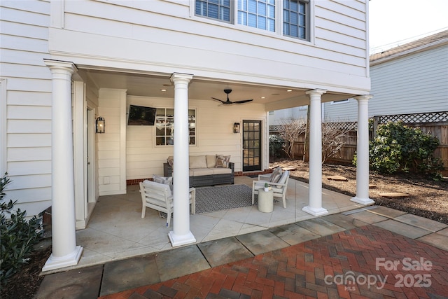 view of patio featuring an outdoor living space and ceiling fan