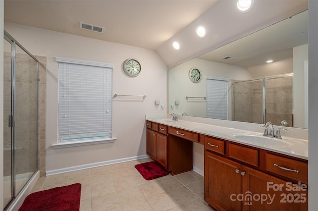 bathroom with vanity, tile patterned floors, and walk in shower