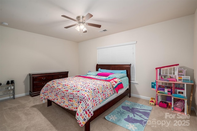 bedroom featuring ceiling fan and light carpet