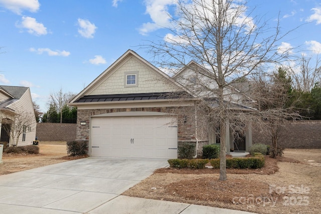 view of front of property with a garage