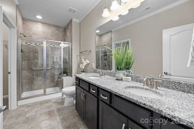 bathroom with ornamental molding, vanity, toilet, and a shower with door