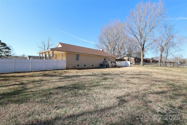 view of yard with central AC