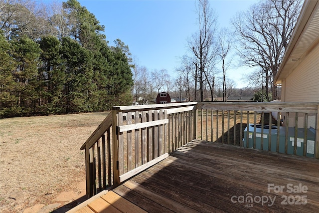 deck featuring a yard