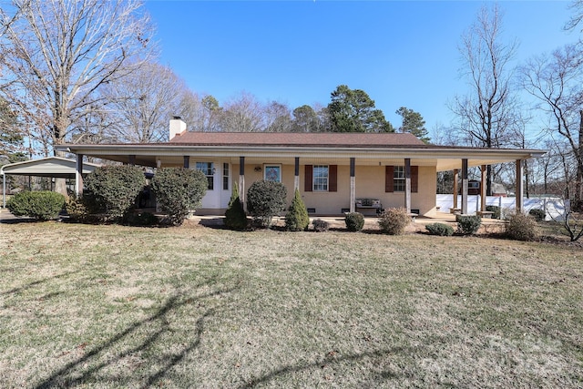 view of front of home with a porch and a front yard