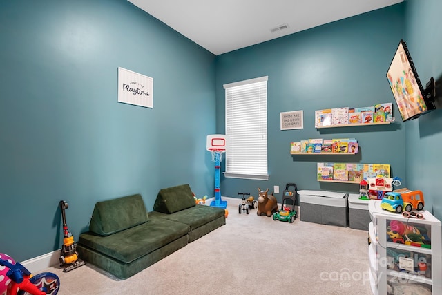 recreation room with carpet floors