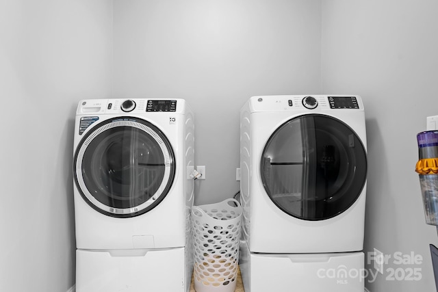 laundry room featuring independent washer and dryer