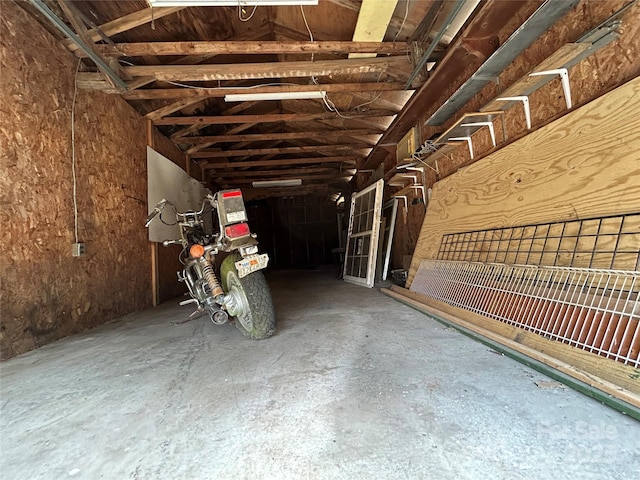 misc room with concrete flooring