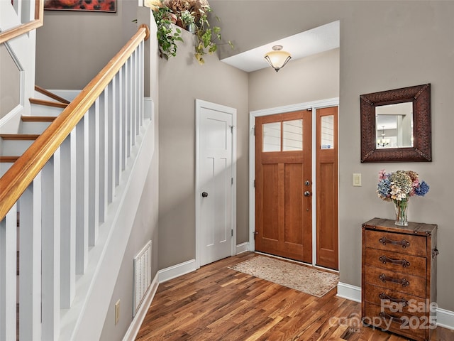 foyer featuring hardwood / wood-style floors