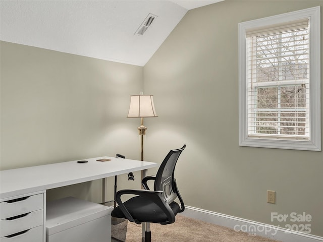 office featuring lofted ceiling and carpet floors