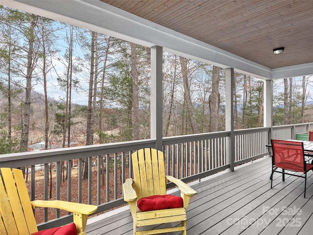 sunroom / solarium with wooden ceiling