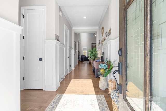 corridor featuring hardwood / wood-style floors