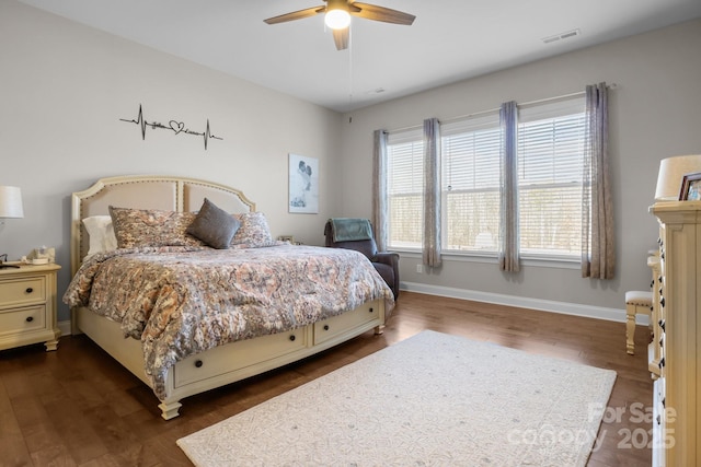 bedroom featuring dark hardwood / wood-style floors and ceiling fan