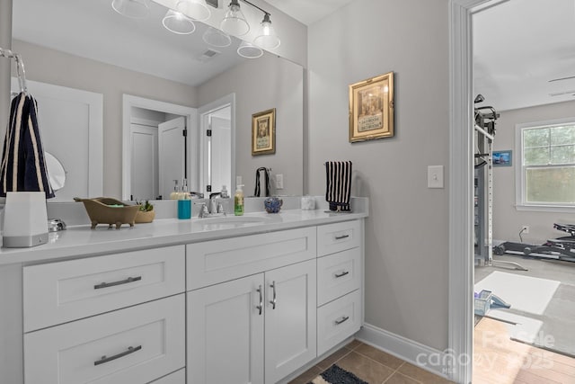 bathroom with vanity and tile patterned flooring