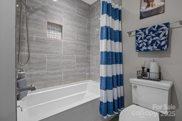 bathroom featuring shower / bath combo with shower curtain and toilet