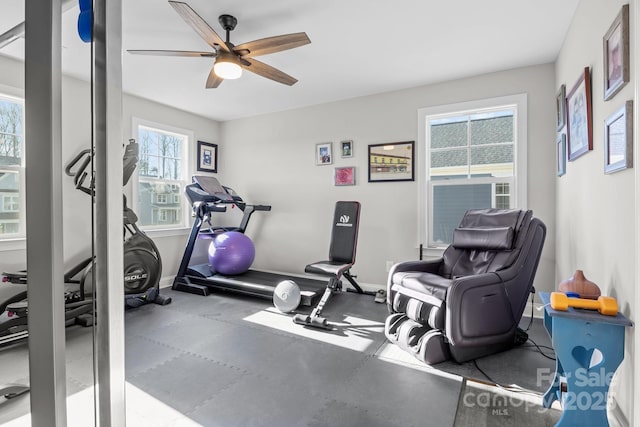 workout area with ceiling fan