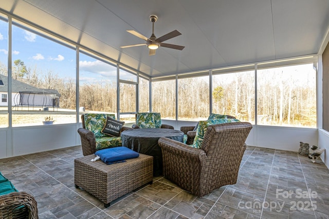 sunroom / solarium with ceiling fan