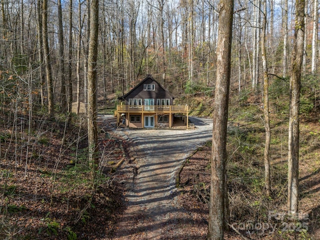 view of front of house with a wooden deck