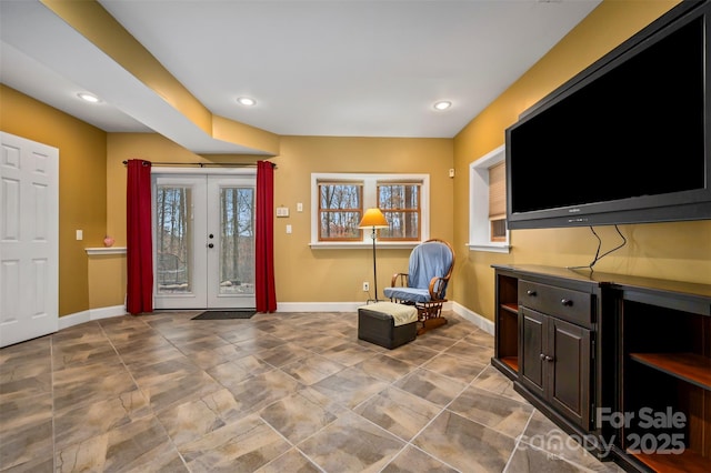 living area featuring french doors