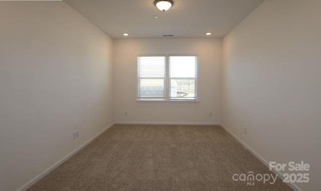 spare room with carpet flooring