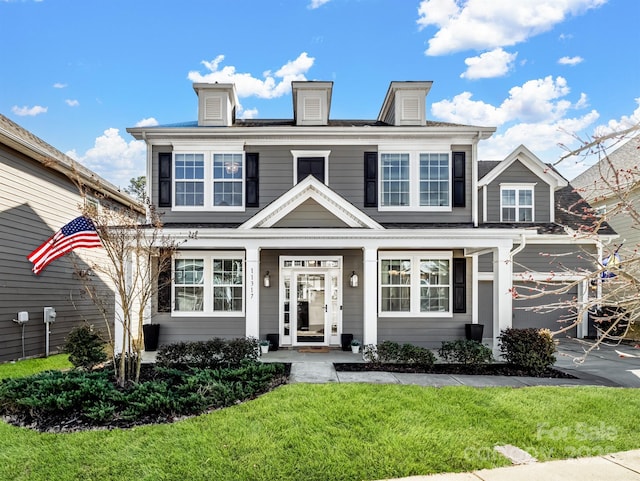 view of front of home featuring a front lawn