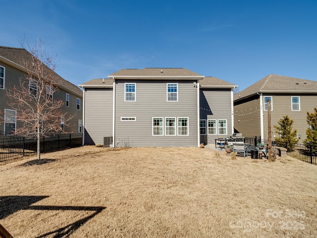 back of house with central AC unit and a patio area