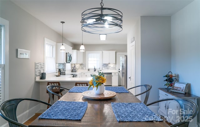 dining area featuring sink