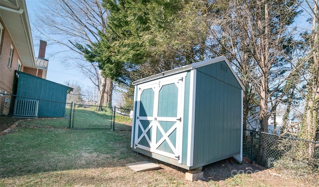 view of outdoor structure with a yard