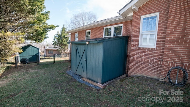 view of outbuilding featuring a lawn