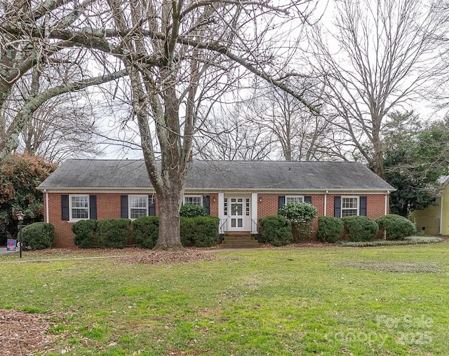 ranch-style house with a front yard