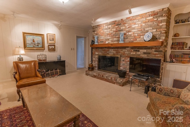 carpeted living room featuring crown molding and a brick fireplace