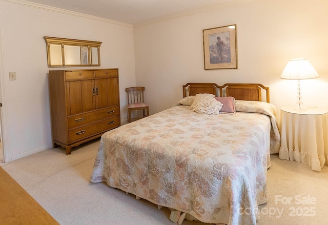 carpeted bedroom with ornamental molding