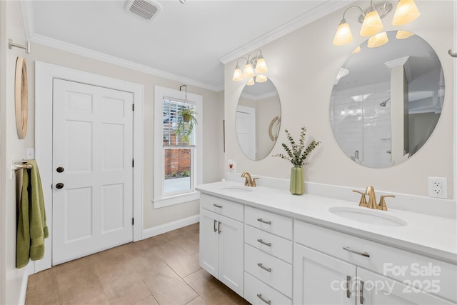 bathroom featuring crown molding, vanity, tile patterned flooring, and a shower with door