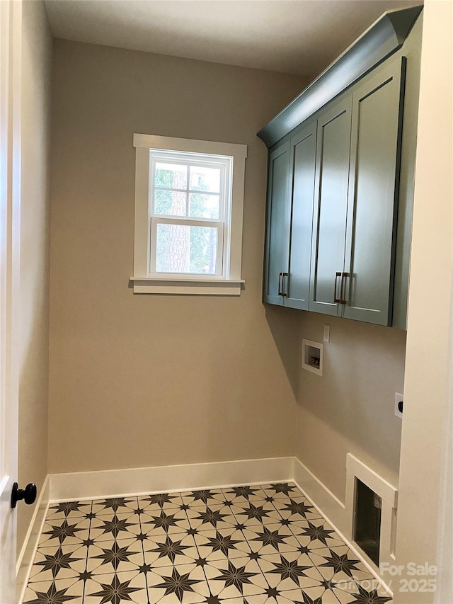 washroom with cabinets, electric dryer hookup, and washer hookup