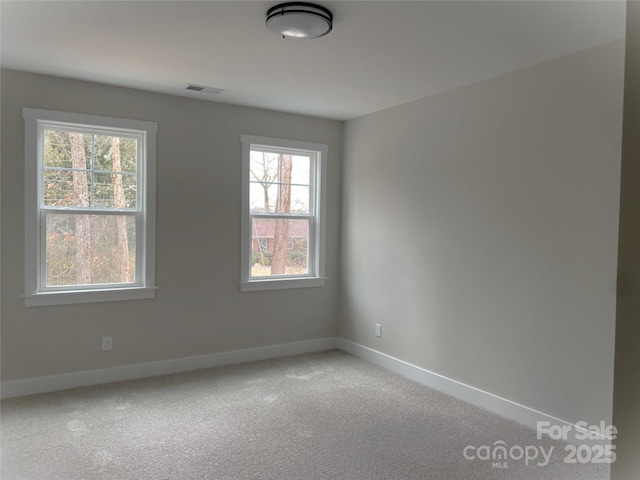 view of carpeted spare room