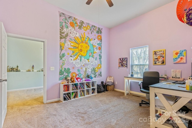 carpeted office space with a high ceiling and ceiling fan