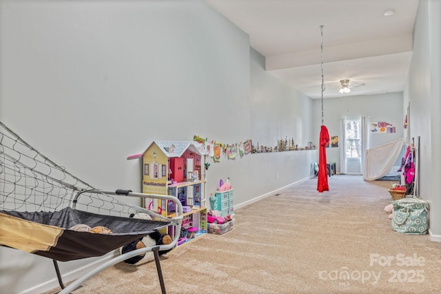 game room featuring light colored carpet