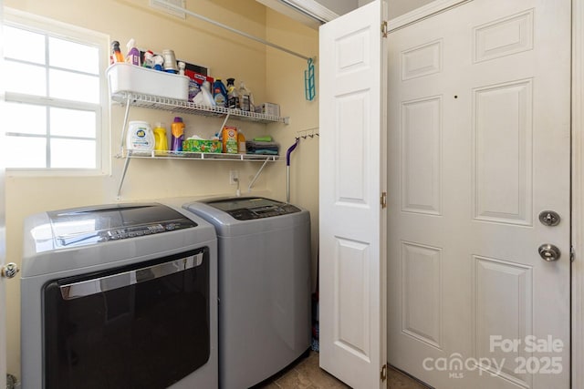 laundry area with washer and clothes dryer