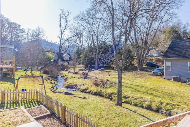 view of yard featuring central AC unit