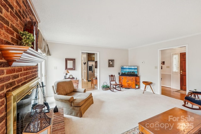 406 Brief Rd W, Indian Trail, NC 28079 - carpeted living room featuring a fireplace and ornamental molding