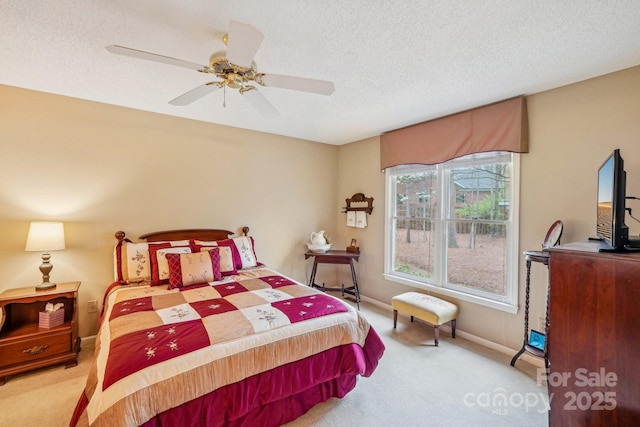 406 Brief Rd W, Indian Trail, NC 28079 - carpeted bedroom featuring a ceiling fan, baseboards, and a textured ceiling