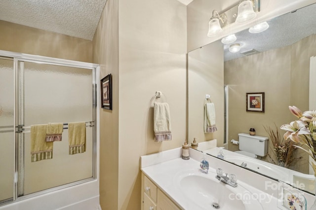 406 Brief Rd W, Indian Trail, NC 28079 - full bath featuring toilet, vanity, a textured ceiling, and visible vents