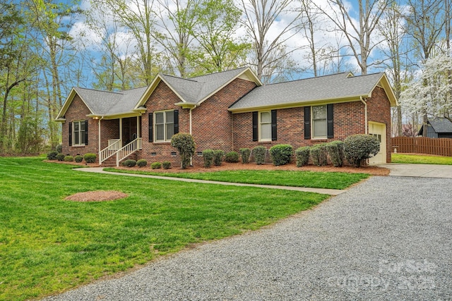406 Brief Rd W, Indian Trail, NC 28079 - ranch-style house featuring driveway, a shingled roof, and brick siding