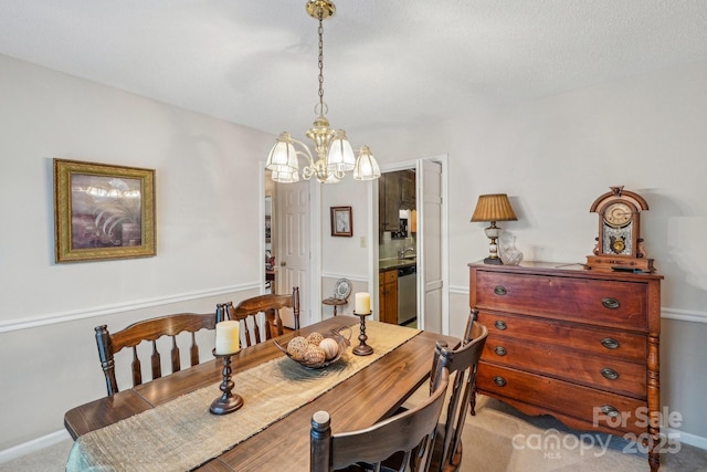 406 Brief Rd W, Indian Trail, NC 28079 - carpeted dining space featuring a notable chandelier and baseboards