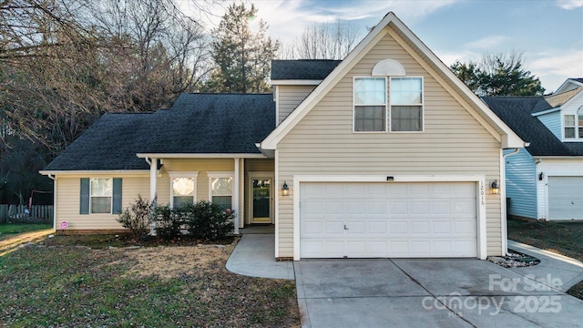 view of front of property featuring a garage