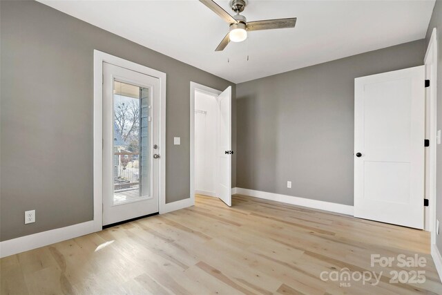 interior space featuring ceiling fan and light hardwood / wood-style flooring