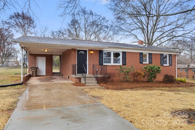 view of front of home featuring a carport