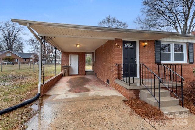 view of front facade with a carport