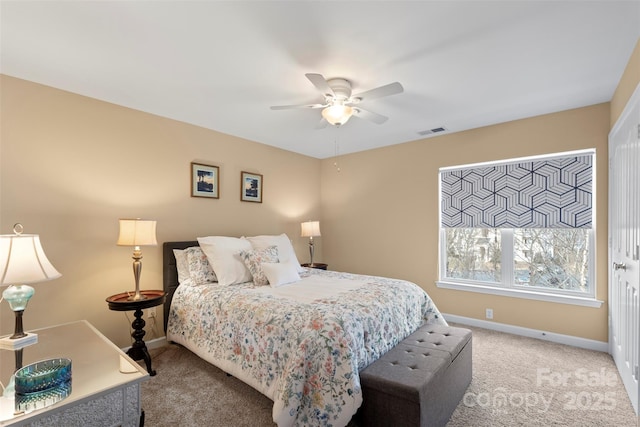 carpeted bedroom featuring ceiling fan